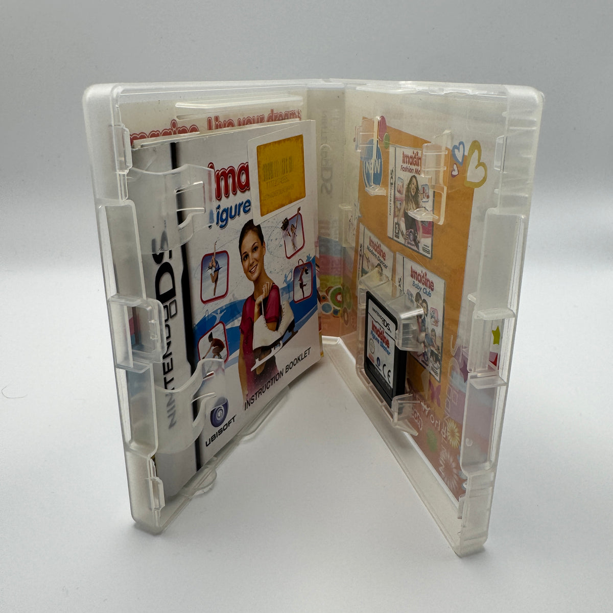 Imagine Figure Skater: open Nintendo DS case showing cartridge and booklet.